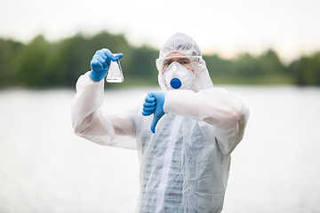 Image showing Ecologist with raised finger down