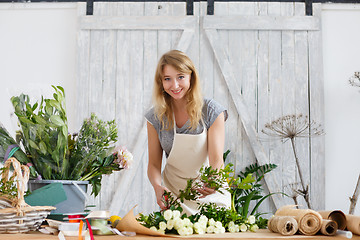 Image showing Photo of smiling florist woman