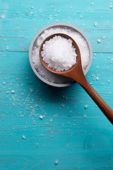 Image showing sea salt in stone bowl and wooden spoon