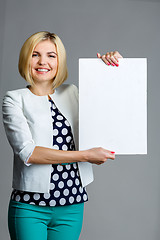 Image showing Image of model with paper