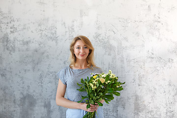 Image showing Photo of florist with flowers