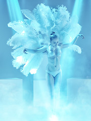 Image showing The studio shot of female modern dancer on blue background