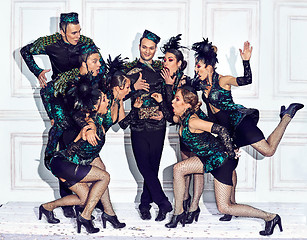 Image showing The studio shot of group of retro dancers