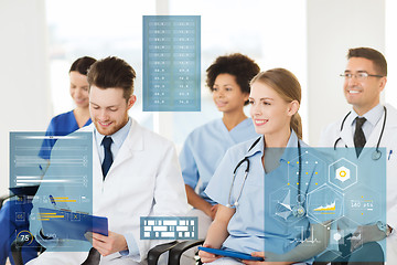 Image showing group of happy doctors on seminar at hospital