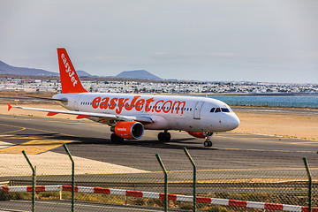 Image showing ARECIFE, SPAIN - APRIL, 15 2017: AirBus A320 of easyjet.com read