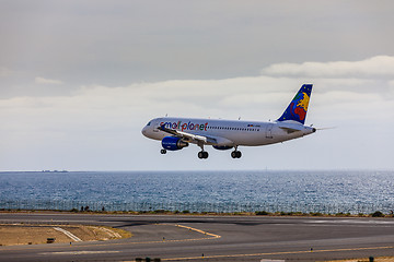 Image showing ARECIFE, SPAIN - APRIL, 15 2017: AirBus A320 of small planet wit