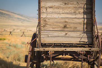 Image showing Abstract of Vintage Antique Wood Wagon In Meadow.