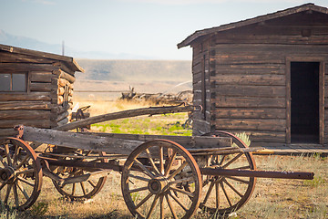 Image showing Abstract of Vintage Antique Wood Wagon and Log Cabins.