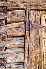 Image showing Abstract of Vintage Antique Log Cabin Wall and Door with Hinge.