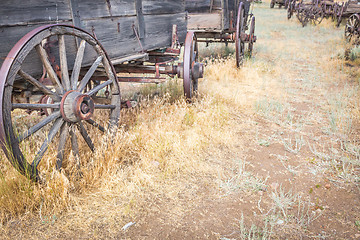 Image showing Abstract of Vintage Antique Wood Wagons and Wheels.