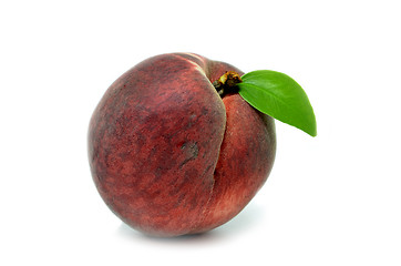 Image showing Peach with leaf isolated on white