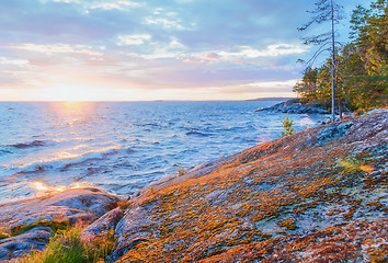 Image showing Rocky Coast of Lake At Sunset