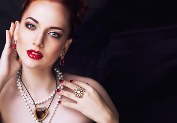 Image showing beauty stylish redhead woman with hairstyle and manicure wearing