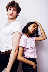 Image showing young couple of mixed races girlfriend and boyfriend having fun on white background, lifestyle teenage people concept 