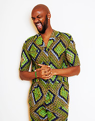 Image showing portrait of young handsome african man wearing bright green nati