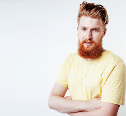 Image showing young handsome hipster ginger bearded guy looking brutal isolated on white background, lifestyle people concept 