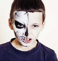 Image showing little cute boy with facepaint like skeleton to celebrate hallow