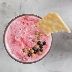 Image showing Strawberry smoothie with cookie