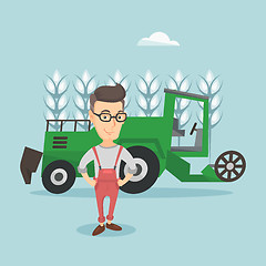 Image showing Farmer standing with combine on background.