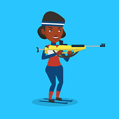Image showing Cheerful biathlon runner aiming at the target.