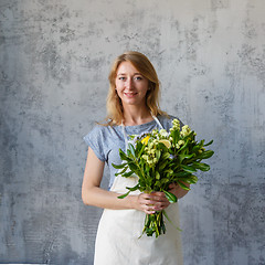 Image showing Picture of florist with bouquet