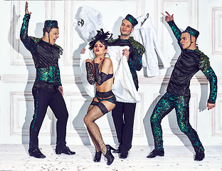 Image showing The studio shot of group of retro dancers