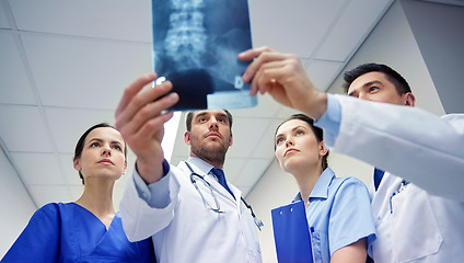 Image showing group of doctors looking at x-ray scan image