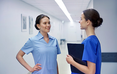 Image showing medics, nurses or doctors talking at hospital