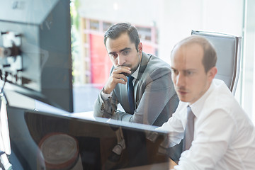 Image showing Business team analyzing data at business meeting.