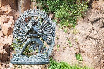 Image showing Tantric Deities statue in Ritual Embrace located in a mountain g