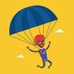 Image showing Young happy man flying with parachute.