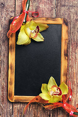 Image showing blackboard and flower