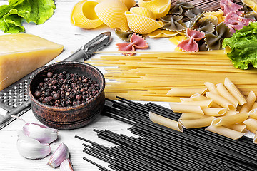 Image showing spaghetti with ingredients for cooking pasta