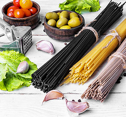 Image showing spaghetti with ingredients for cooking pasta