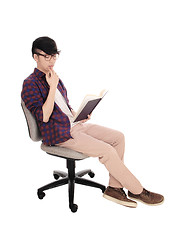 Image showing Asian man reading a book.