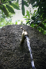 Image showing Water running from outdoor tap