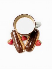 Image showing pastries - eclair and cafe latte