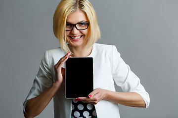 Image showing Woman on empty gray background