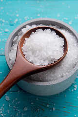 Image showing sea salt in stone bowl and wooden spoon