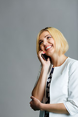 Image showing Young girl talking on phone