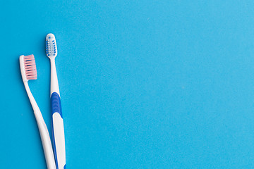 Image showing Two toothbrushes, place for inscription