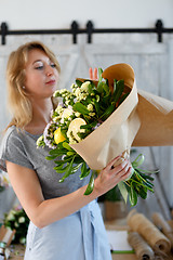 Image showing Photo of florist in apron