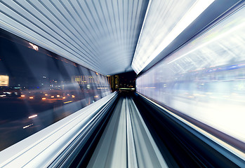 Image showing Tunnel in tokyo at night blurred as idea of speed