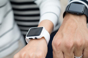 Image showing Couple using smart watch together