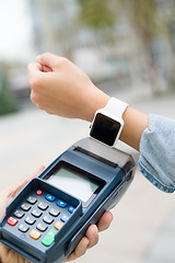 Image showing Customer using smart watch to checkout