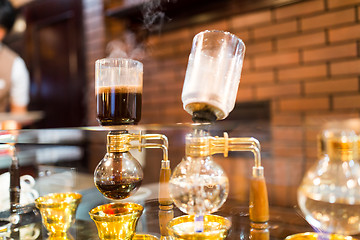 Image showing Siphon vacuum coffee maker on cafe bar