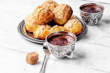 Image showing Profiteroles and hot chocolate