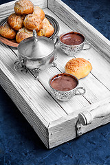 Image showing Profiteroles and hot chocolate