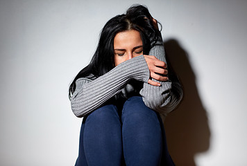 Image showing unhappy woman crying on floor