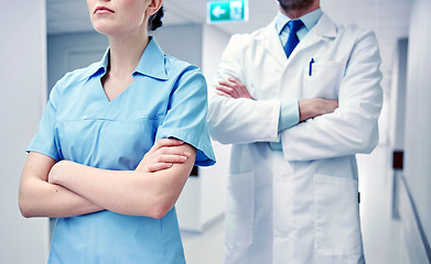 Image showing close up of doctor and nurse at hospital corridor